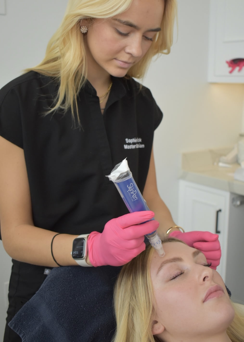Woman Getting Microneedling Treatment from Beautician | Cosmedics MedSpa in Lehi, UT